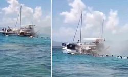Tur teknesinde yangın dehşeti: Yolcular denize atlayarak canını kurtardı