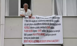 İzmir'de akılalmaz olay: Yaşadığı saldırıyı duyurmak için balkonuna pankart astı!