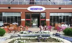 SON DAKİKA Çiğli'de belediyeye ikinci şok: Makam aracından sonra Akvaryum Kafe kurşunlandı!