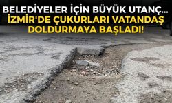 Belediyeler için büyük utanç... İzmir'de çukurları vatandaş doldurmaya başladı!