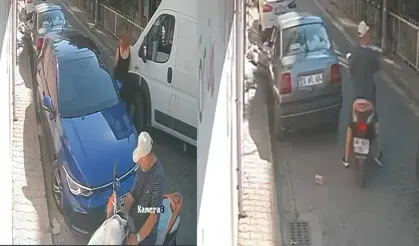 Bayraklı'da yere düşen deste deste parayı alan şüpheli kamerada!