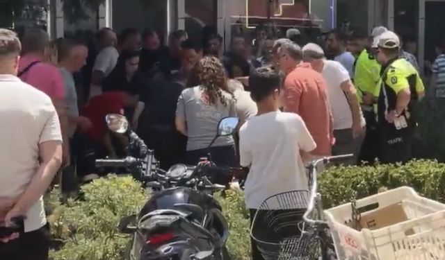 İzmir'de film sahnelerini aratmayan anlar: Silahlı saldırganı trafik polisi yakaladı!