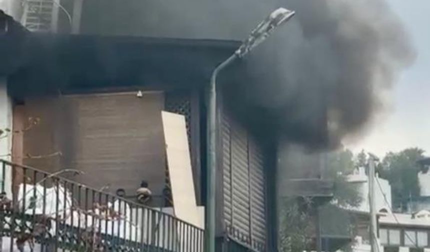 Önce eşyaları attı sonra evi ateşe verdi!