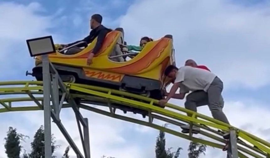 Buca'da eğlence burunlarından geldi! Lunaparkta baş aşağı asılı kaldılar