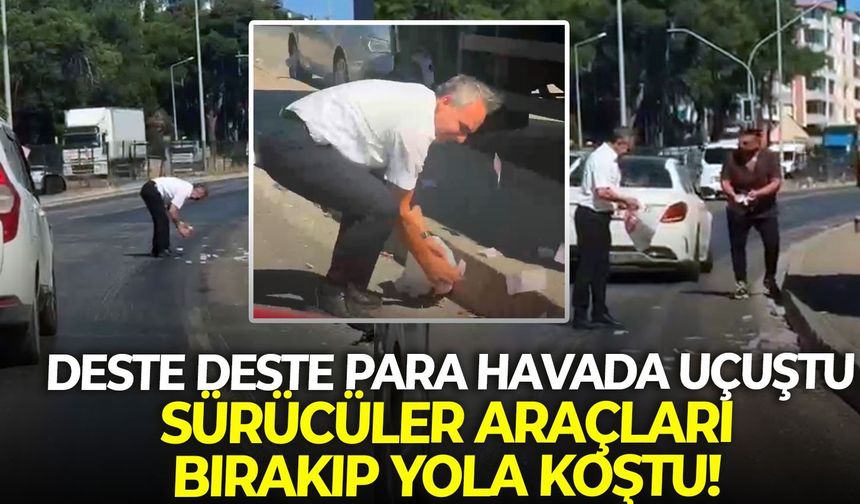 İzmir'de deste deste para havada uçuştu: Sürücüler araçları bırakıp yola koştu!