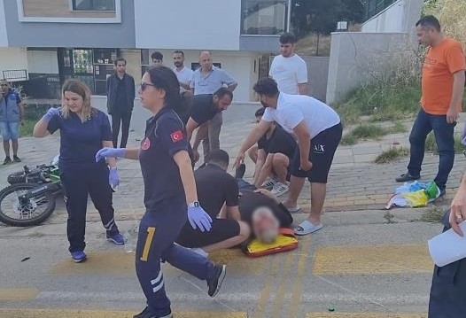 Sağlık ekiplerinin ilk müdahalesinin ardından başından yaralanan K.M. Kuşadası Devlet Hastanesi'ne götürüldü