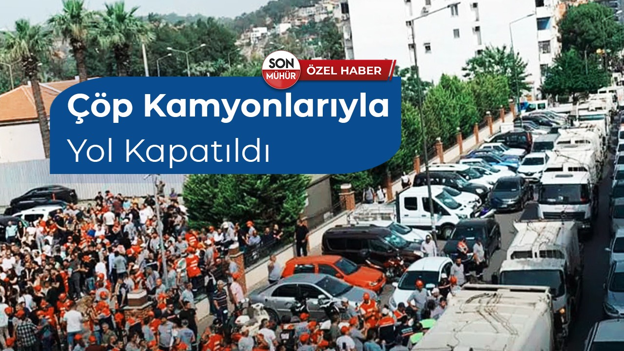 COP KAMYONLARI ILE YOL KAPATILDI