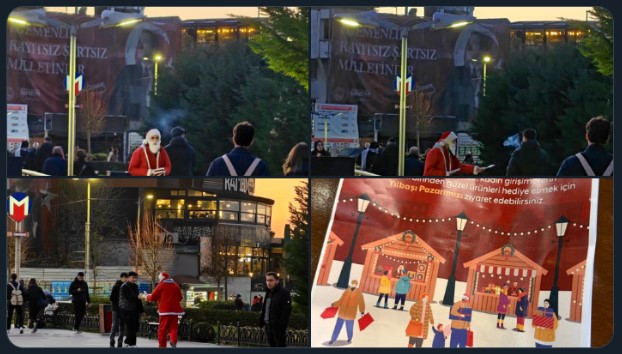 Noel Baba kostümüyle broşür dağıttı