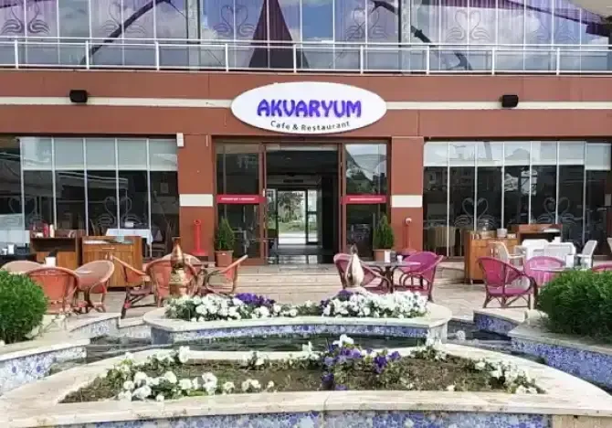 SON DAKİKA Çiğli'de belediyeye ikinci şok: Makam aracından sonra Akvaryum Kafe kurşunlandı!